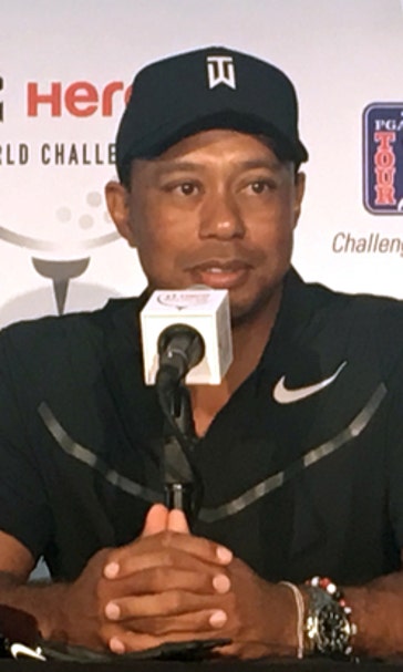 Woods says he's on the 'other side' of pain, loving life